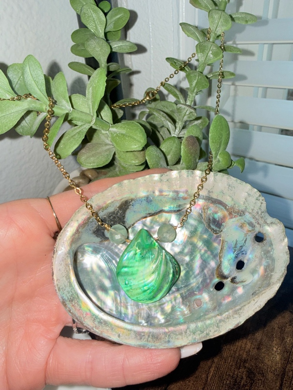 Green statement shell necklace.